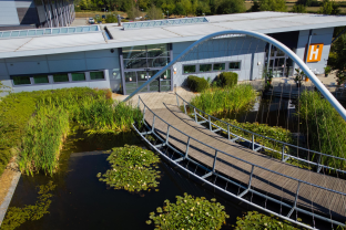 Hethel Engineering Centre Exterior Aerial Shot Looking Over Lake