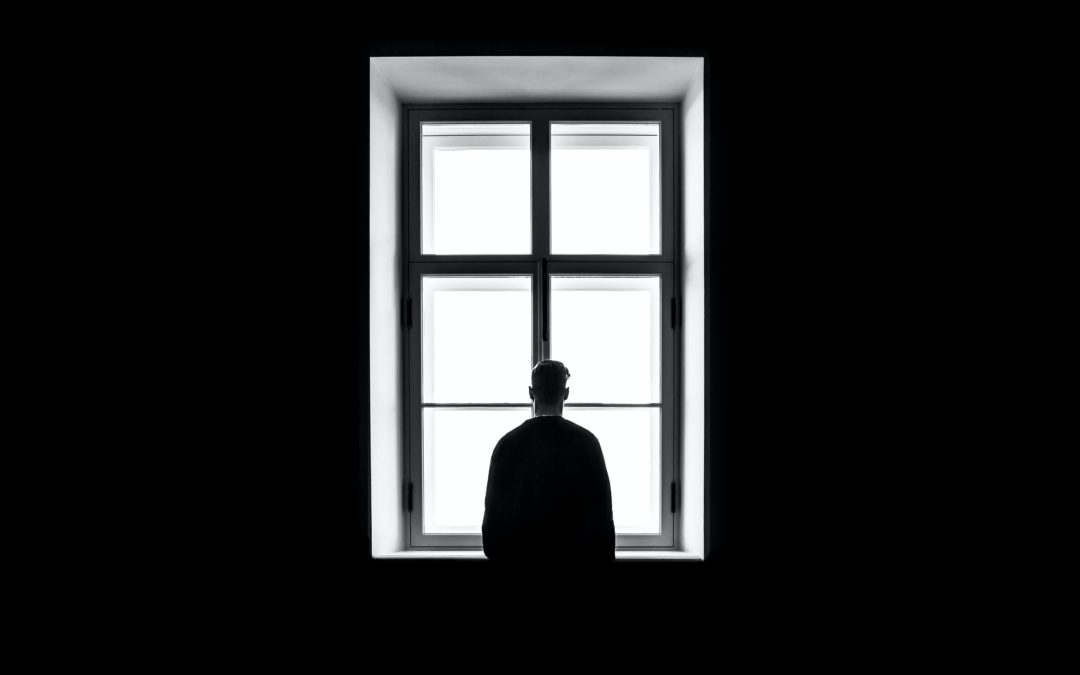 man at window